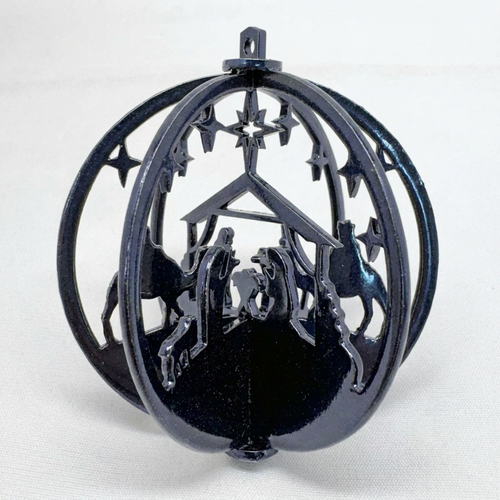 Dark blue 3D metal Nativity ornament with dimensional highlights and shadows