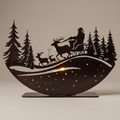 Santa's Sleighride metal candle luminary with warm lighting
