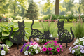 Kitty Silhouette Garden Stakes displayed in garden landscape